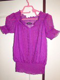 Blouse fushia smockée à la taille
